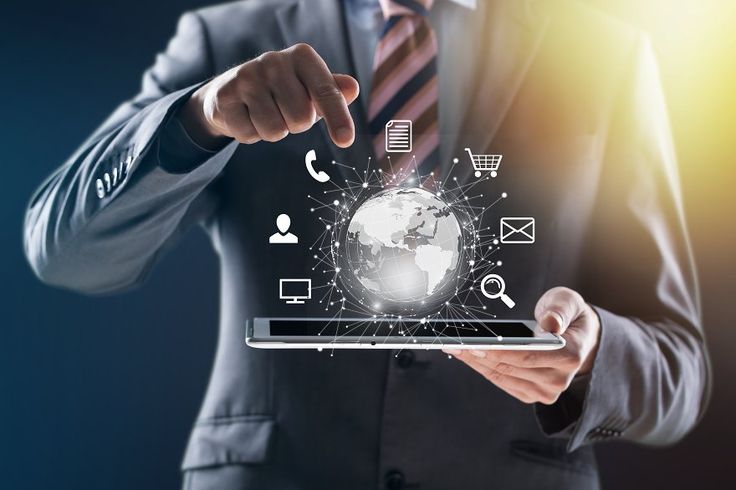 a business man holding a phone